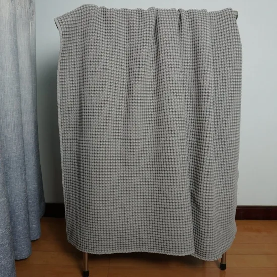 Venta al por mayor de fábrica de algodón de lujo suave, ligero y transpirable, manta de gofre de enfriamiento para cama, sofá y sofá con 3D y efecto teñido de hilo 410GSM